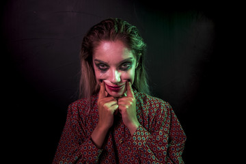 Make-up woman on a black background