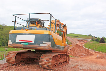 Digger on a road construction site