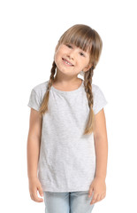 Little girl in stylish t-shirt on white background