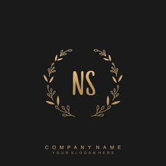 letter NS surrounded by beautiful and elegant flowers and leaves. Wedding monogram logo template.