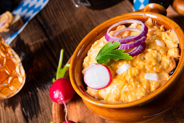 rustic Bavarian obazda with radishes and onions