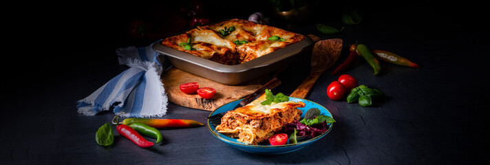 spicy lasagne with tomato sauce and basil - obrazy, fototapety, plakaty