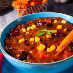 chili con carne with sweet potato and spicy nachos