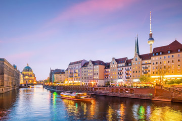 Berlin skyline with Spree river at sunset twilight