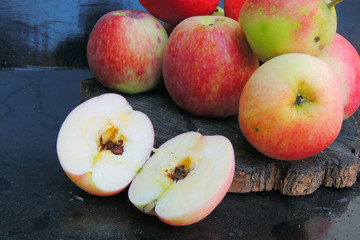 apples on a black background