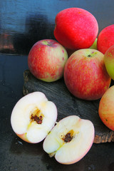 apples on a black background