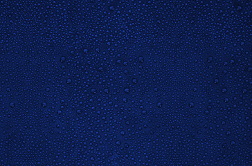 Abstract dark blue water drops on a background.