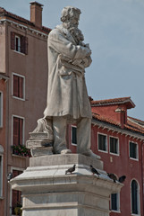 Fototapeta na wymiar Statue of Niccolo Tommaseo at Campo Santo Stefano, Venice, Italy