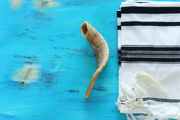 religion image of shofar (horn) on white prayer talit. Rosh hashanah (jewish New Year holiday),...