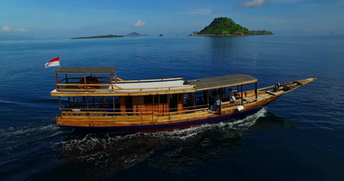 Komodo National Park Aerial Footage Rinca, Padar, Islands, Villages, Beaches, Tourist Boats and Mountains.