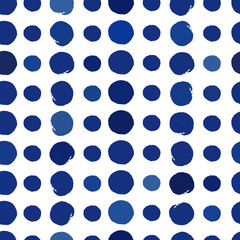 Fototapeta premium Abstract seamless pattern with blue circles. Polka dot pattern. Vector hand drawn texture with different sized circles. Creative illustration for wrapping paper, wallpaper, textille print.