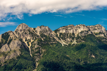 Italian Alps near Trento, with the peaks of Vigolana and Becco di Filadonna photographed from the Caldonazzo lake, Trentino Alto Adige, Italy, south Europe