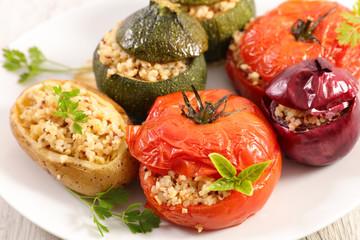 baked vegetable with bulgur, tomato, zucchini and potato