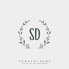 letter SD surrounded by beautiful and elegant flowers and leaves. Wedding monogram logo template.
