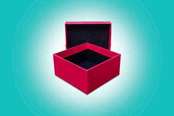 Red Gift Box Open Against Cyan Background