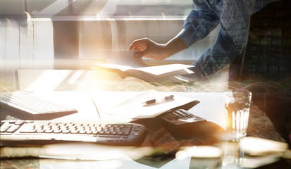 Young business woman working in office by the desk. Business concept, work in progress, achievement and support. 