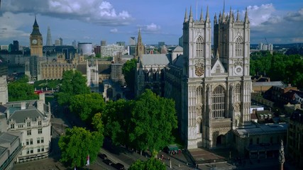 Aerial view of London including Westminster Abbey and Big Ben. Major sights included in this view are Big Ben and Houses of Parliament, the London Eye, Shard, Canary Wharf and the Supreme Court - Powered by Adobe
