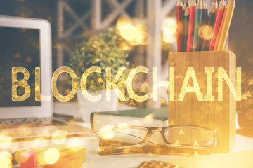 Crypto theme hologram with glasses on the table background. Concept of blockchain. Double exposure.