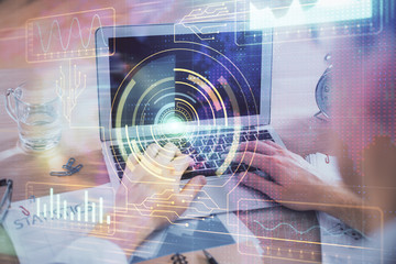 Businessman with computer background with technology theme hologram. Concept of big data. Double exposure.