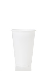 Empty white plastic cup isolated on white background shoot in studio.