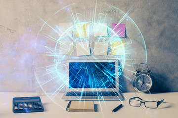 Double exposure of business theme icons and work space with computer background. Concept of success.
