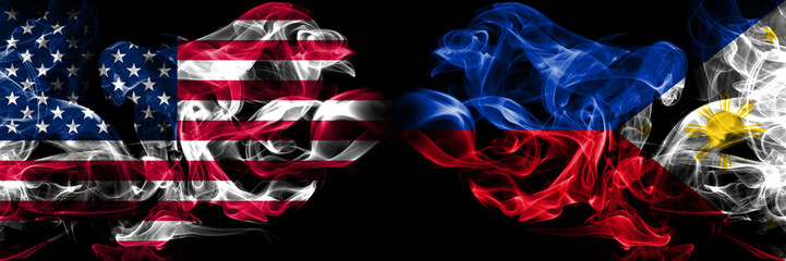 United States of America, USA vs Philippines, Filipino background abstract concept peace smokes flags.