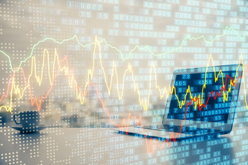 Forex market chart hologram and personal computer background. Double exposure. Concept of...