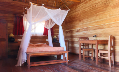 Mosquito net on the bed