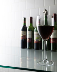 red wine on glass shelf