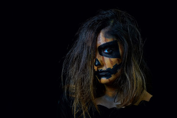 portrait of a woman dressed as halloween pumpkin