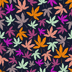 seamless vector pattern repeat of hand-drawn autumn leaves in a striking palette