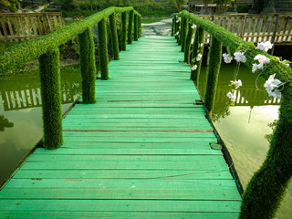 Fototapeta premium Old wooden bridge across river