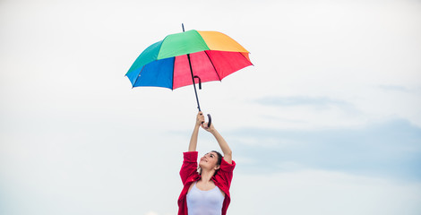 Ready for new adventures. autumn fashion. Rainbow umbrella protection. carefree time spending. pretty woman with colorful umbrella. rainy weather. Fall positive mood. autumn weather forecast