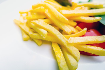 Golden French fries potatoes ready to be eaten