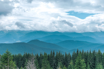 Carpathian mountains landscape with blue sky and clouds, nature background