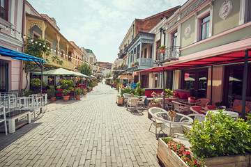 Old town in Europe at sunset with retro vintage Instagram style filter