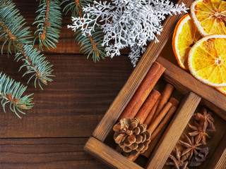 Christmas holiday composition : Beautiful close-up  of dry Oranges, Cinnamon sticks and star Anis,...