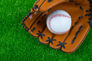Baseball ball on the green grass. close-up