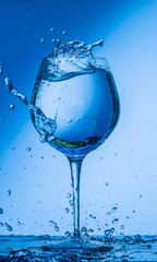 glass, wine, drink, water, alcohol, wineglass, blue, isolated, empty, white, liquid, transparent, clear, beverage, clean, object, crystal, goblet, reflection, drop, bar, single, fresh, cold, celebrati