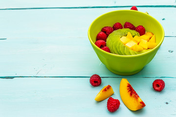 Oatmeal bowl with fresh berries and fruits