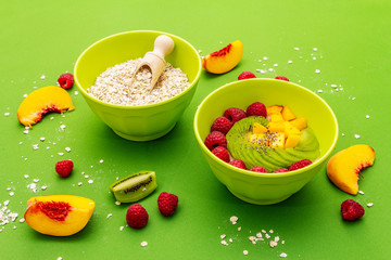 Oatmeal bowl with fresh berries and fruits