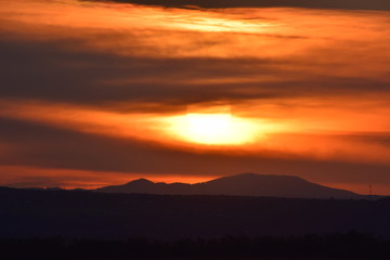 sunset over the hills
