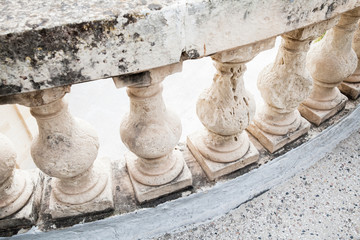 Fototapeta na wymiar Balcony balusters made of lime stone