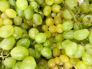 A bunch of green grapes in a market
