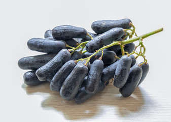 A bunch of ripe gold-fingered hetty grapes