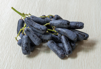 A bunch of ripe gold-fingered hetty grapes