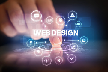 Finger touching tablet with web technology icons and WEB DESIGN inscription, web technology concept