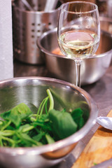 Glass of wine and green salad