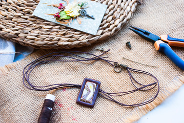 Working process of assembly handmade necklace.