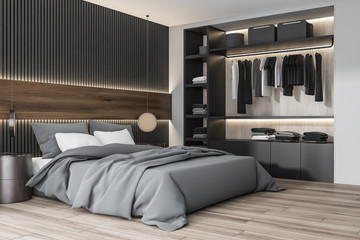 Wooden and white bedroom corner with wardrobe